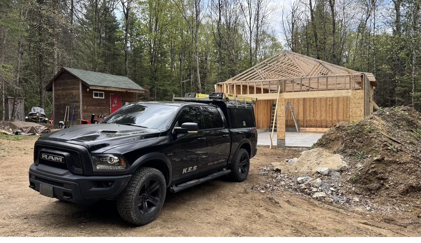 King Electrical Services truck parked at a new residential build during framing, Ottawa area